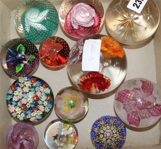 A collection of Caithness and other glass paperweights